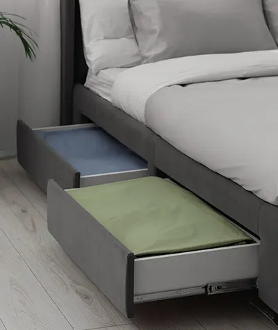 Le lit avec tiroirs de rangement